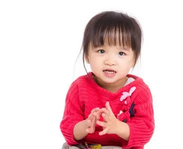 亚洲小女孩鼓掌的手照片